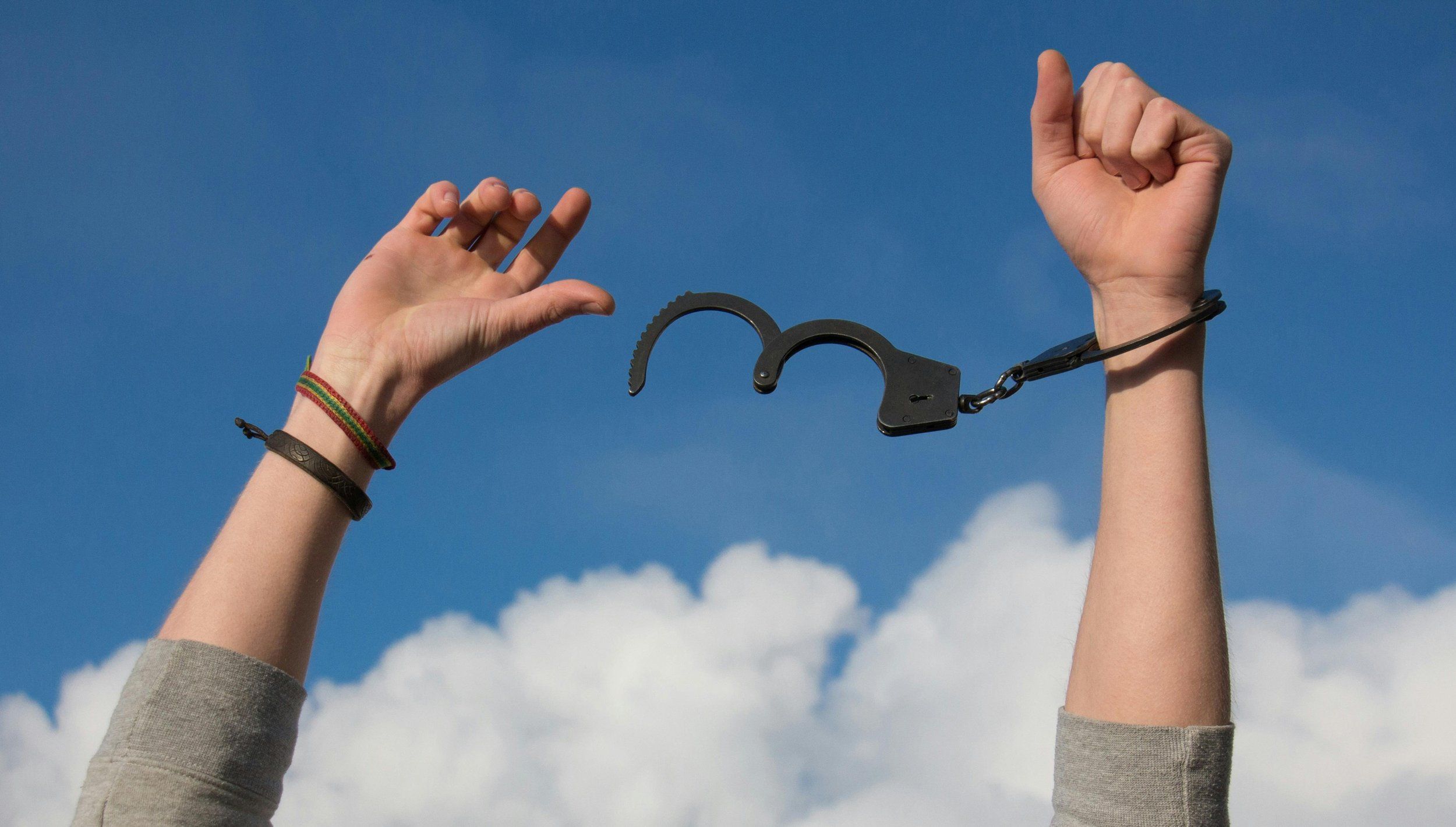 breaking-chains-handcuff-loose